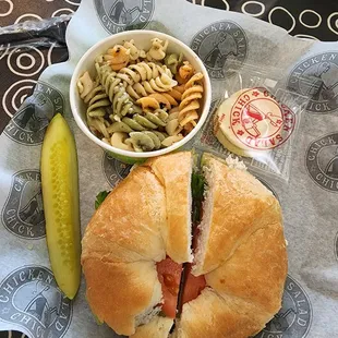 Fancy Nancy chicken salad on croissant with pasta salad