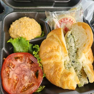 The Chick meal- Lemon Basil on a croissant and a side scoop of buffalo chicken salad