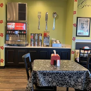 a table and chairs in a restaurant