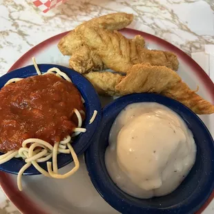 Chicken strip dinner with mashed potatoes &amp; spaghetti