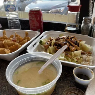 Sitting at the bar by the entrance. 1. Miso Soup 12. Six Pieces Crab Cheese Wontons