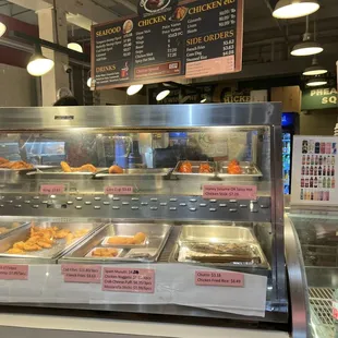 a variety of food items in a display case