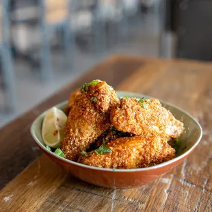 a bowl of fried chicken