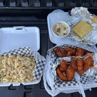 Bacon Mac and cheese, sweet and spicy chicken wings, grandmas banana pudding with candied pecans and cornbread