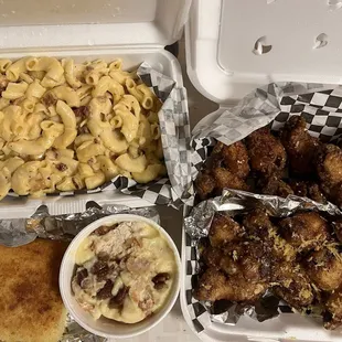 Bacon Mac and cheese, lemon chicken and soy garlic chicken, cornbread and grandmas banana pudding with candied pecans