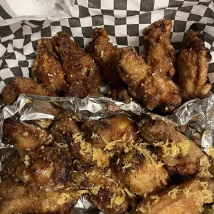 Lemon chicken on bottom and soy garlic chicken on the top super delicious