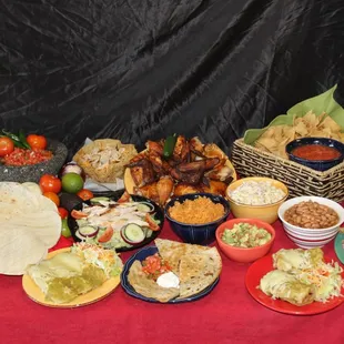 a spread of mexican food on a table