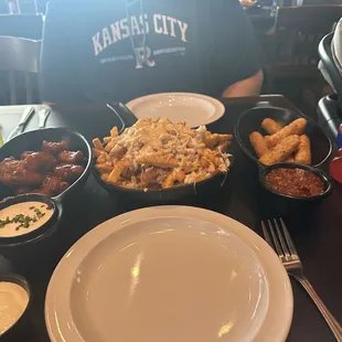 Ultimate Crab Fries. Sweet Fire Boneless Wings. Mozzarella sticks.