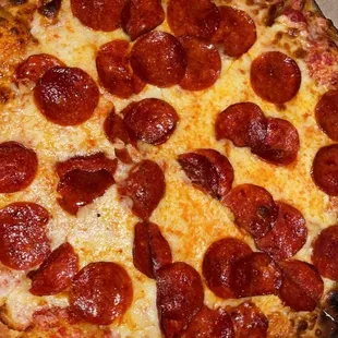 $12 plus tax for a 12 inch pepperoni pizza