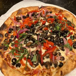 The Verdura 12" pizza. With mushrooms, olives, bell peppers, onion, basil.