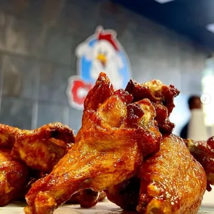 a pile of chicken wings on a table