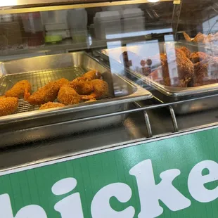 two trays of fried chicken