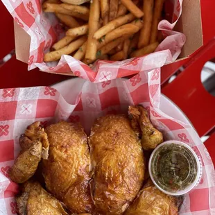 Whole roast chicken and truffle fries with Ají and lemon aioli dipping sauce.