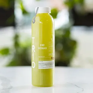 a bottle of juice on a table