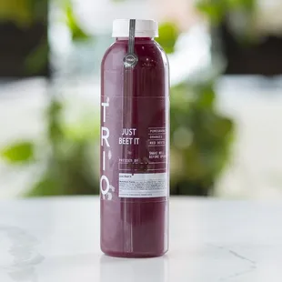 a bottle of juice on a table