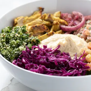 a white bowl filled with vegetables