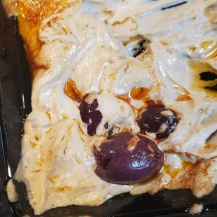 a close up of a piece of pizza