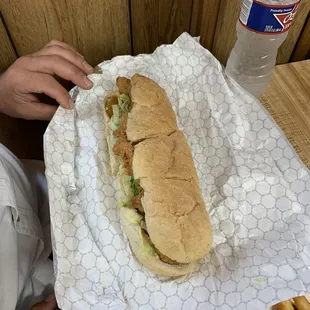 a person eating a sandwich