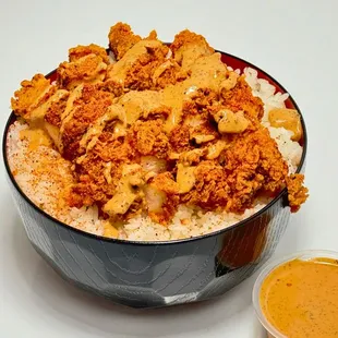 a bowl of rice and sauce