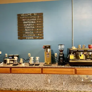 a coffee bar with coffee machines