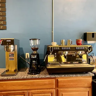 a coffee machine and coffee grinder