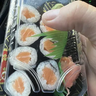 Worlds smallest salmon roll $6 Each piece smaller than the tip of my finger.