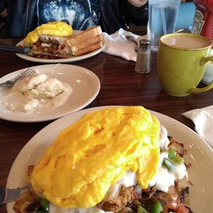 Country fried skillet,,biscuits and gravy,,the big green cup is the coffee  cup