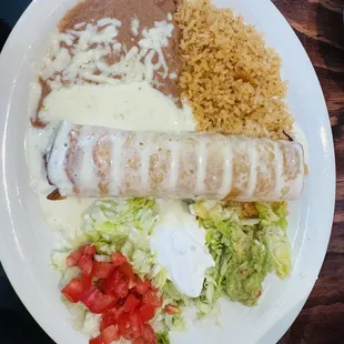 Lunch "Small" Shredded Chicken chimichanga with rice and beans. YUM!