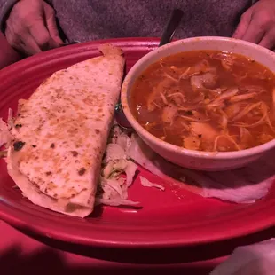 Chicken soup with a side quesadilla