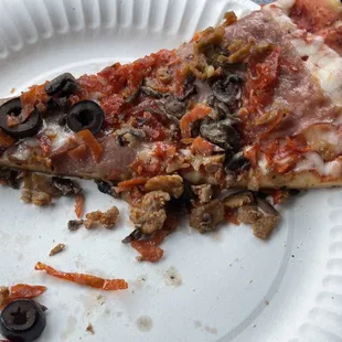 Tasty, but cold slice of pizza