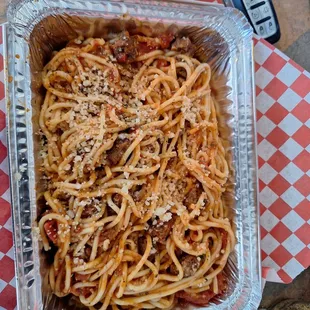 Spaghetti with meat sauce. It also came with cheese bread.