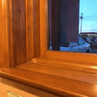 a sign on a window sill