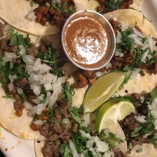 $1 street tacos for taco Tuesday! Carne asada and al pastor.