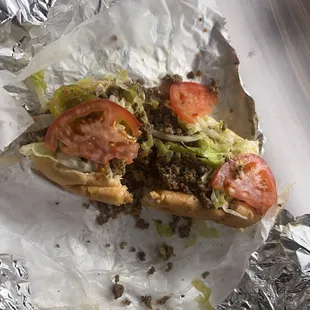 My wife added lettuce, tomatoes, pickles, mayo, oil, vinegar, salt, and pepper.
