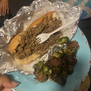 a person holding a plate of food