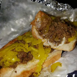 two hot dogs with mustard and relish