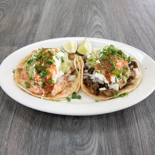 Two different kinds of Super Tacos (Left Shredded chicken) (Right steak super taco)