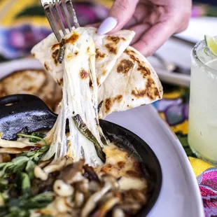 Fundido, melted goat cheese &amp; queso oaxaca, rajas poblanas, wild mushrooms, flour tortillas