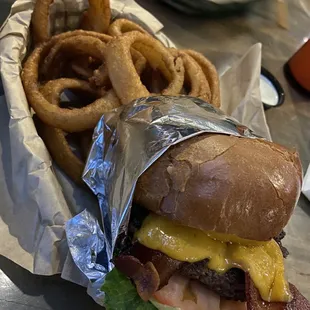 a burger and onion rings