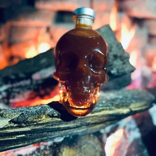 a skull shaped bottle of whiskey