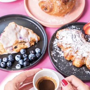 a person holding a cup of coffee