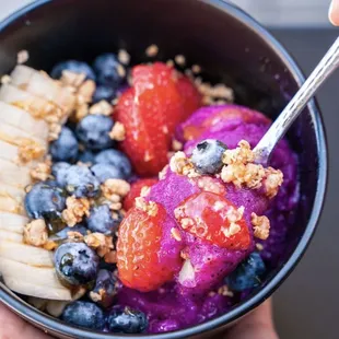a bowl of fruit and granola