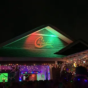 a house with christmas lights on the roof