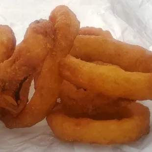 Mildly seasoned batter onion rings.