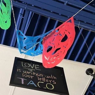 a sign hanging from a ceiling