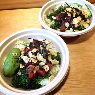 two bowls of food on a table