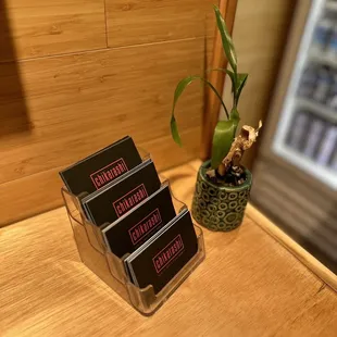 three business cards on a table