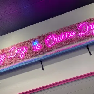 a neon sign that says every day is chukk day