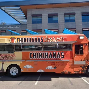 a food truck parked in a parking lot