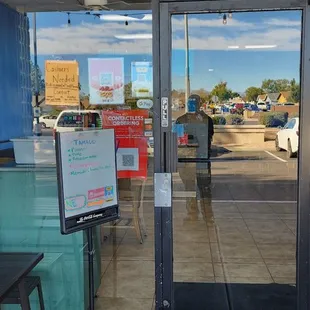 the entrance to a restaurant